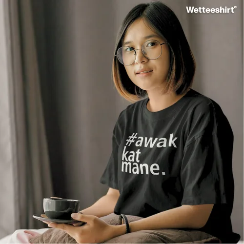 t-shirt-mockup-of-a-young-lady-having-her-tea-on-bed.jpg