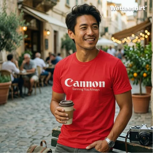 "Cannon parody T-shirt inspired by Canon logo, featuring witty slogan ‘Shooting You Always.’ Trendy Singapore streetwear unisex short sleeve tee in red, black, and white. 100% cotton graphic shirt for men and women, perfect for casual fashion, photography lovers, and parody apparel fans.
