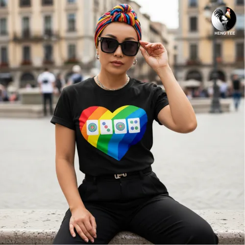 Unisex black short sleeve T-shirt with large rainbow heart graphic featuring four colorful button-style icons, pride-inspired Singapore streetwear by Wet Tee Shirt®