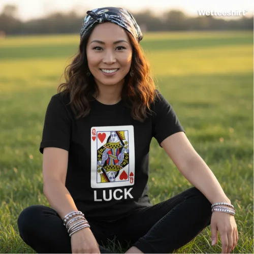 Unisex black short sleeve T-shirt with bold Queen of Hearts playing card graphic and slogan “LUCK,” witty Singapore streetwear by Wet Tee Shirt®