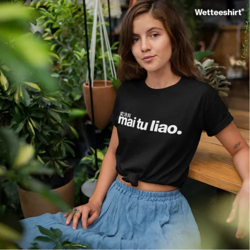 Unisex black short sleeve T-shirt with bold white bilingual slogan “买 tu liao.” and smaller Chinese text, witty Singapore streetwear by Wet Tee Shirt®