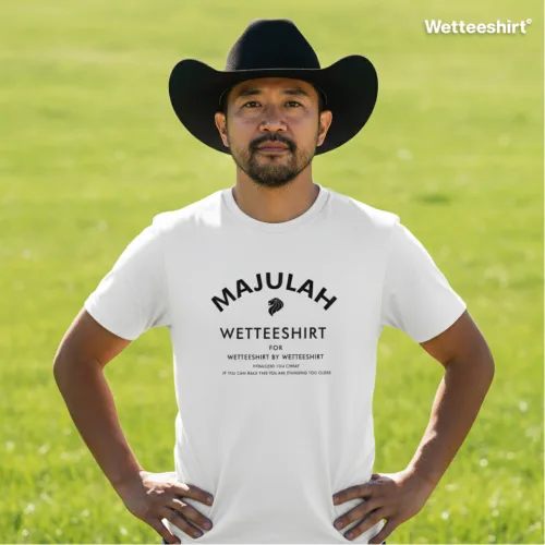 Unisex white short sleeve T-shirt with bold black slogan “MAJULAH WETTEESHIRT FOR WETTEESHIRT BY WETTEESHIRT,” witty Singapore streetwear by Wet Tee Shirt®