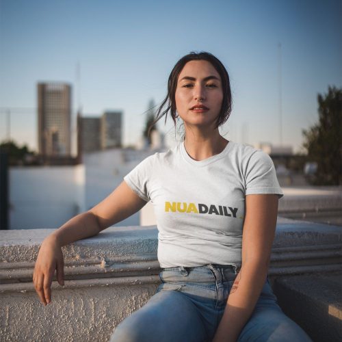 Nua-daily-t-shirt-mockup-of-a-woman-in-a-city-setting-1-1.jpg