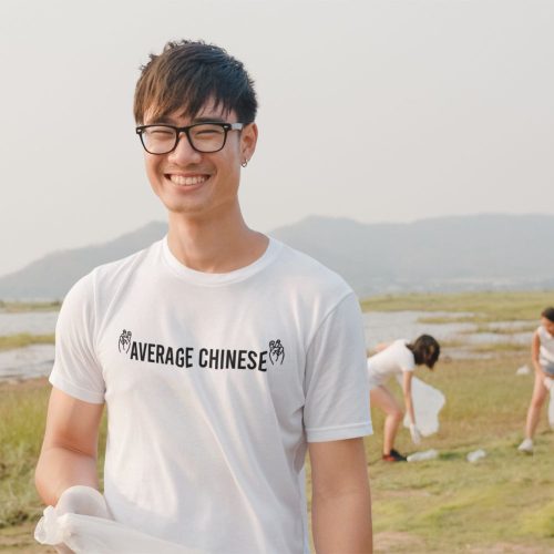 average-chinese-round-neck-t-shirt-featuring-a-volunteer-man-smiling-at-the-camera