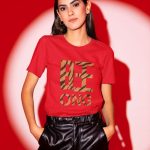 bella-canvas-t-shirt-mockup-tiger-of-a-woman-posing-against-a-red-lighting.jpg