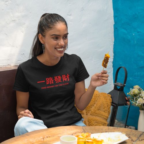 gildan-t-shirt-mockup-featuring-a-smiling-woman-eating-street-indian-food.jpg