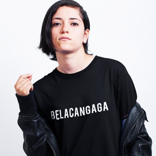 girl-with-an-attitude-wearing-a-tshirt-mockup-against-a-white-wall.jpg