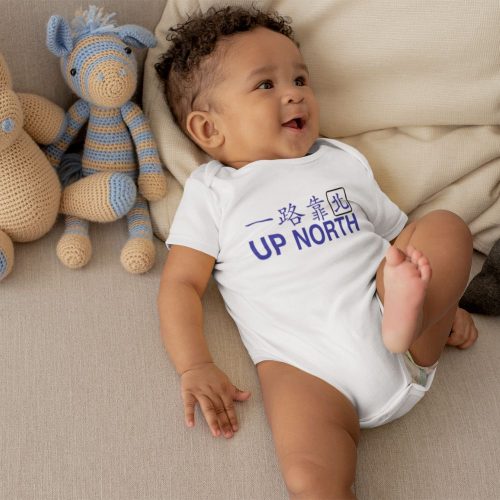 onesie-mockup-of-a-cute-baby-boy-lying-in-bed-with-stuffed-animals.jpg