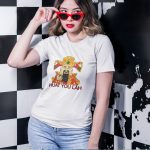 round-neck-tee-mockup-of-a-woman-with-sunglasses-posing-by-a-checkered-background.jpg