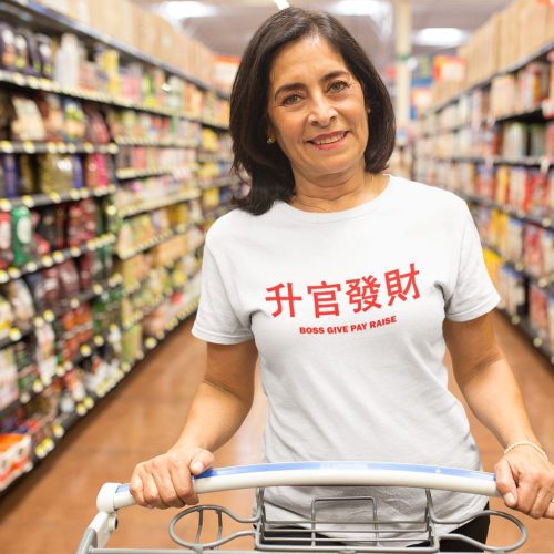 senior-lady-wearing-a-t-shirt-mockup-while-grocery-shopping-at-the-supermarket.jpg