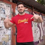 t-shirt-gold-mockup-of-a-fitness-man-posing-against-a-wall-with-posters.jpg