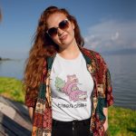 t-shirt-mockup-of-a-young-lady-standing-near-the-sea-shore.jpg
